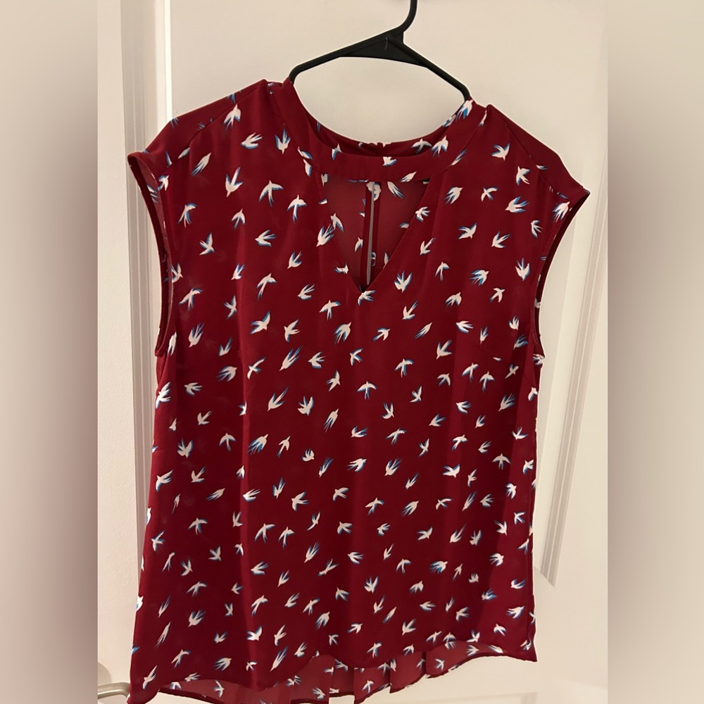 Flowy Red Top with Cute Bird Pattern and Keyhole Detail